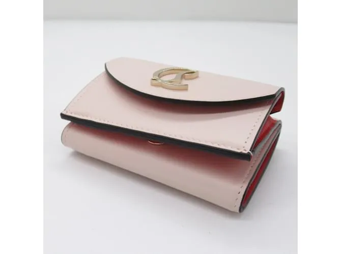 Cartera de cuero rosa de tres pliegues Christian Louboutin 