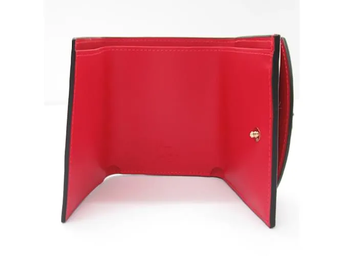 Cartera de cuero rosa de tres pliegues Christian Louboutin 