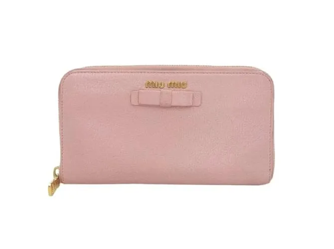 Miu Miu Cartera de cuero con cremallera alrededor y lazo en muy buen estado Rosa 