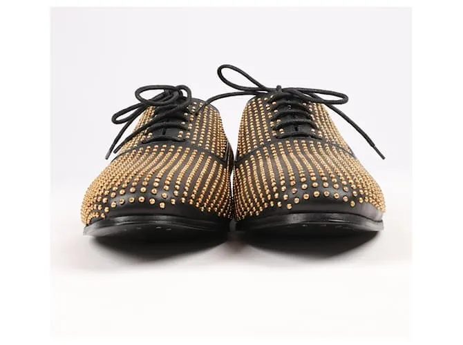 Zapatos de cuero Saint Laurent en negro y dorado, talla 38 RO328349 