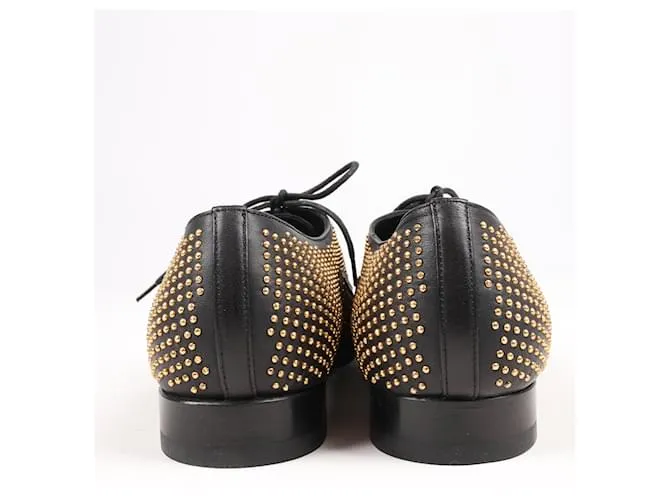 Zapatos de cuero Saint Laurent en negro y dorado, talla 38 RO328349 